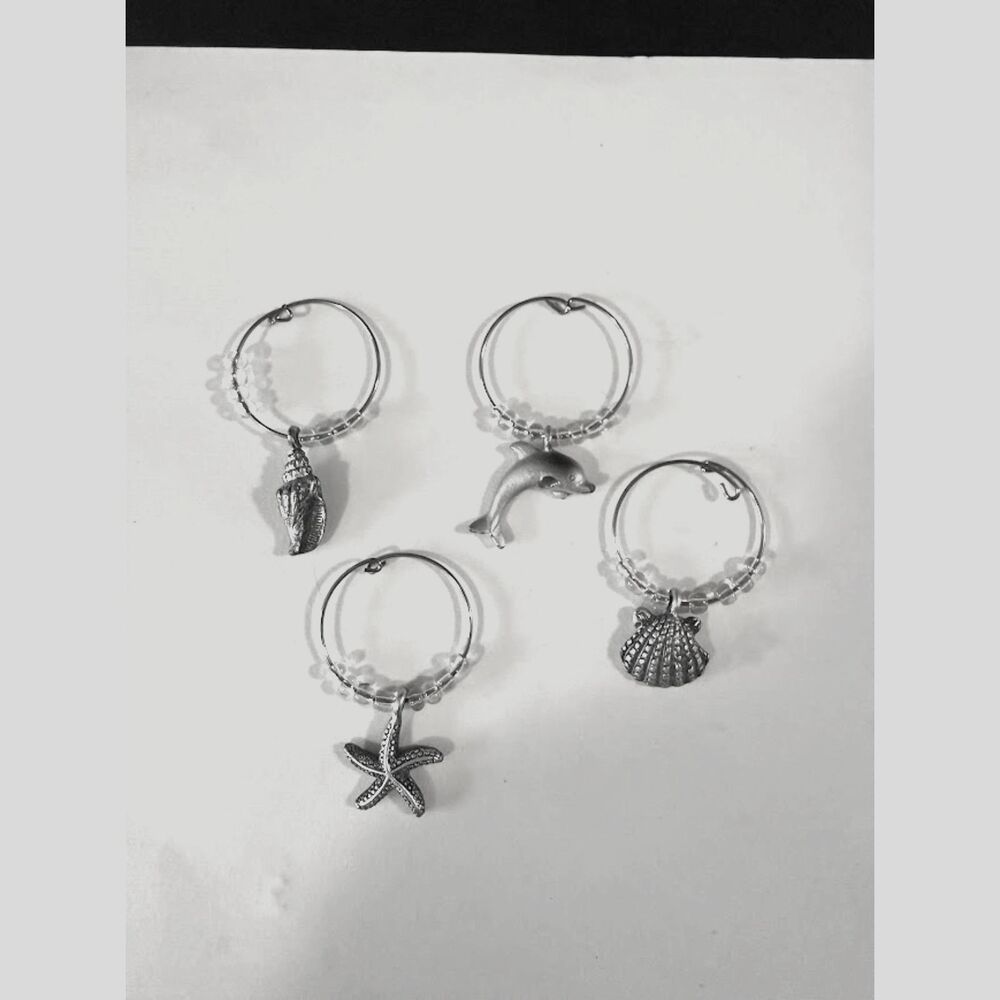 set of beach-themed wine glass charms